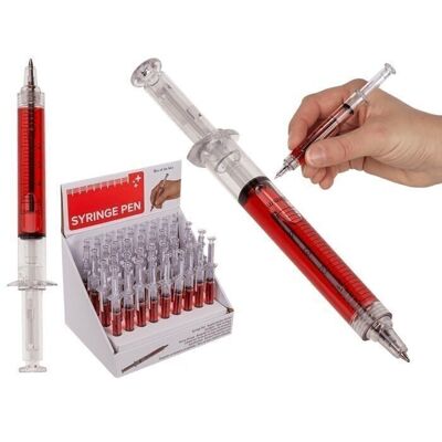 pen, syringe with red liquid,