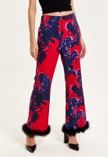 Liquorish - Pantalon ajusté rouge à imprimé floral avec bordure duveteuse - Noir 1