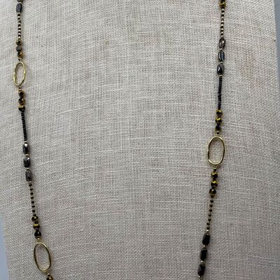 Lange Halskette aus Stahl mit runden Perlen, länglichen ovalen Mustern