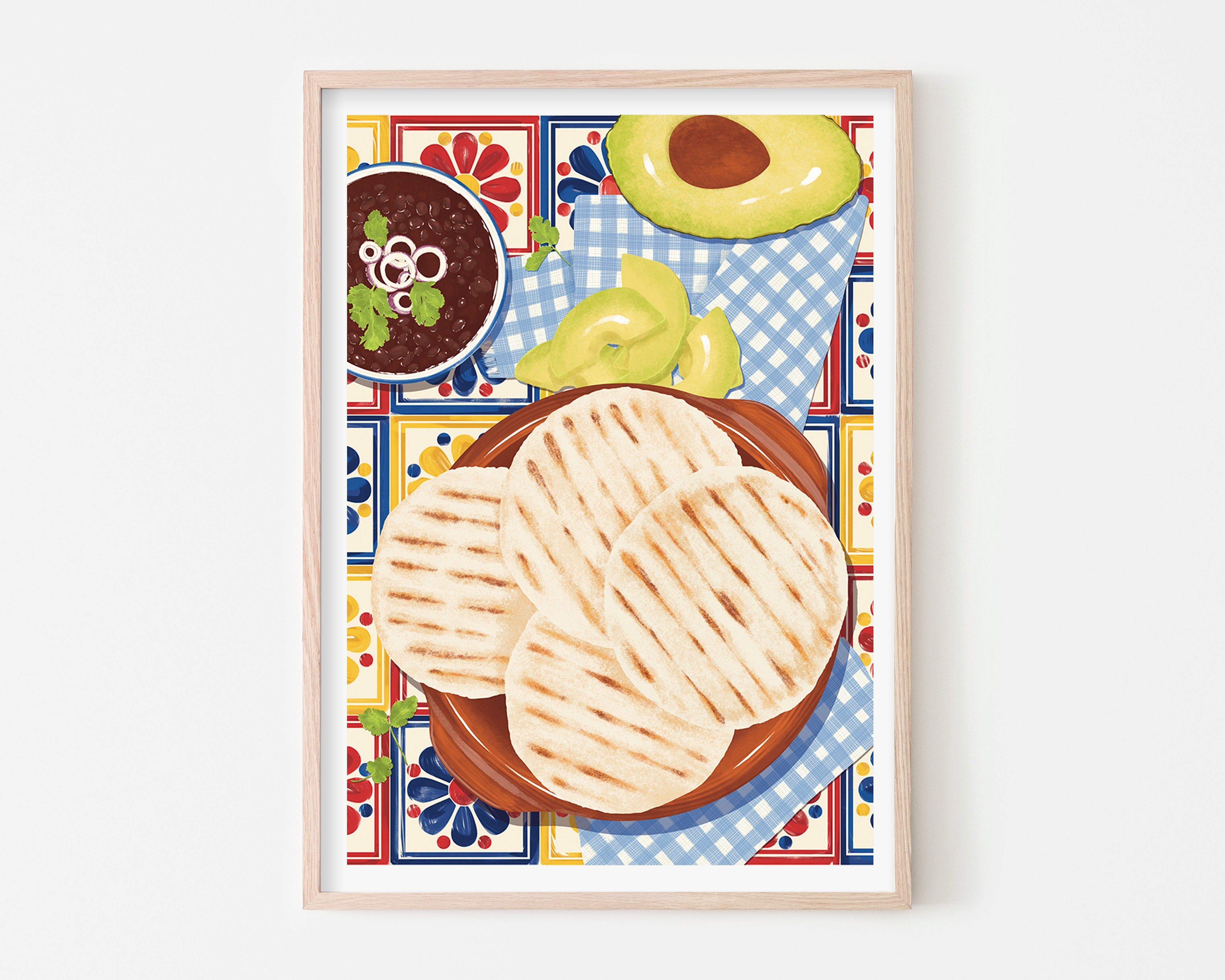 Stampa artistica per colazione con arepas, avocado e fagioli neri