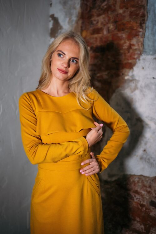 Mustard yellow long-sleeved top with ruffle