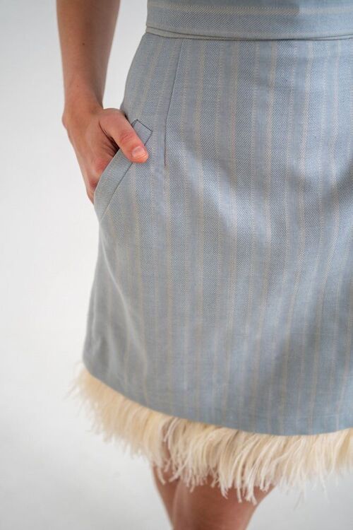 Dreamy blue mini skirt with feathers and pockets