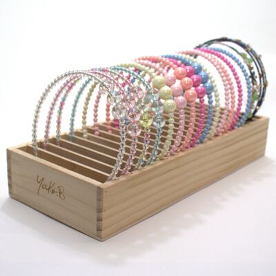 YUKO B HEADBAND OFFER. Wooden display including the entire collection of headbands, 2 per model and 34 in total