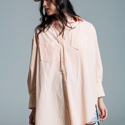 Blouse oversize orange clair à rayures blanches