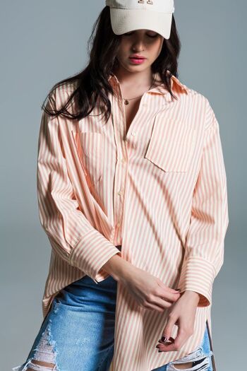 Blouse oversize orange clair à rayures blanches 5