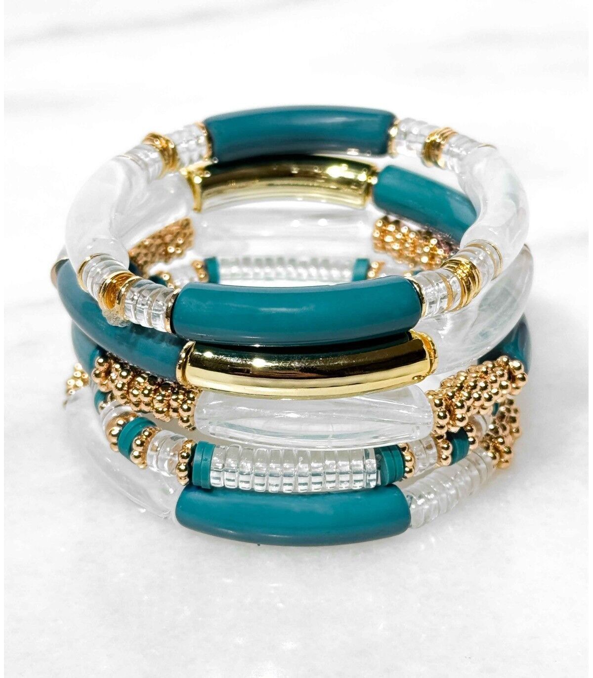 Set di braccialetti tubolari in resina su elastico - Blu anatra