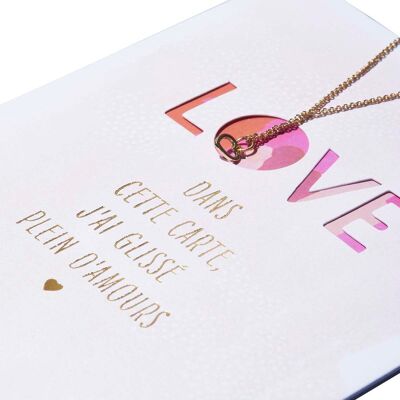 Collar de corazón con tarjeta de amor