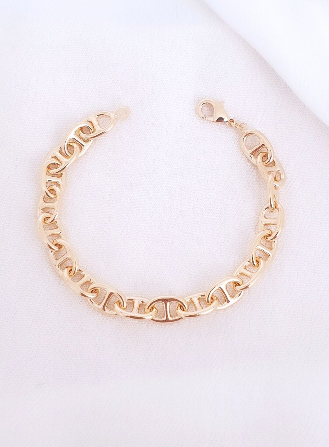 Bracciale in maglia blu navy placcata oro