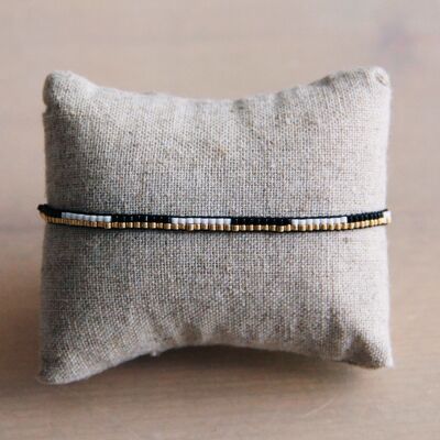 Pulsera tejida negro/blanco/oro