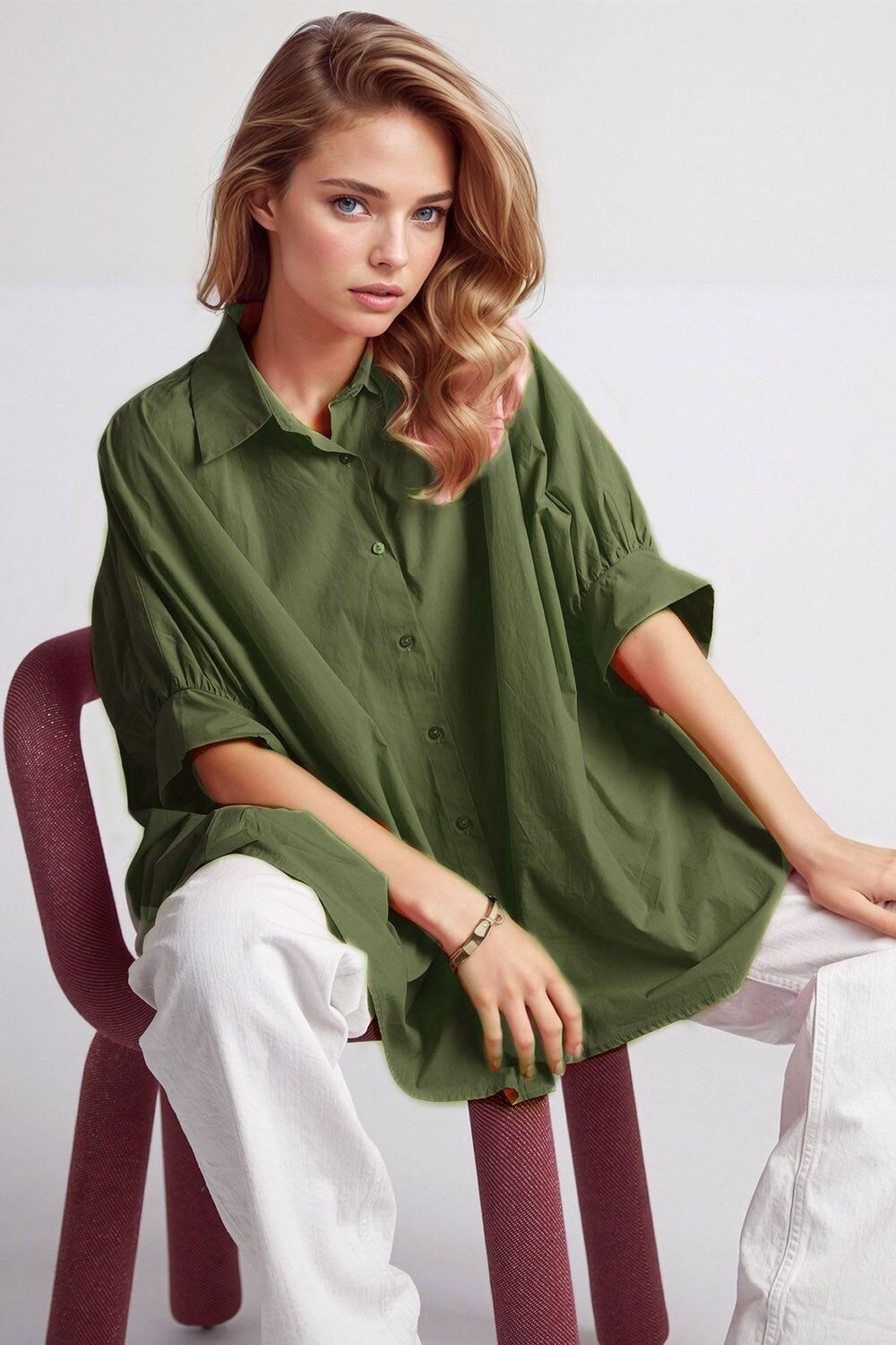 Blusa oversize verde con maniche corte