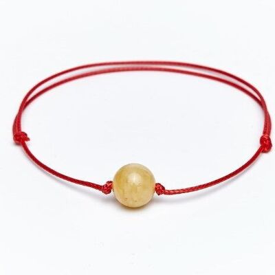Bracelet ambre fil rouge laiteux