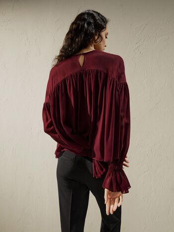 Blouse avec épaules semi-transparentes et volants 2