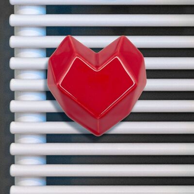Heartbeat hanger for radiators and towel warmers
