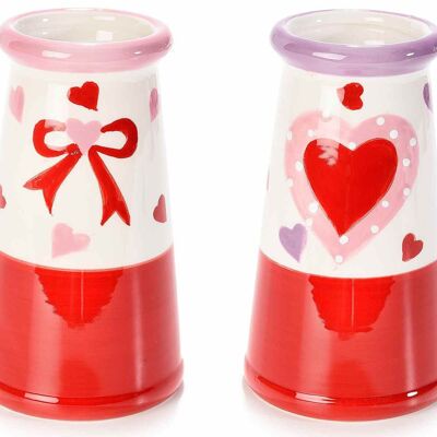 Colored glossy ceramic jars with bow and heart decorations