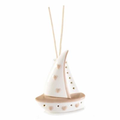 Porcelain boats with heart decorations and wooden essence sticks