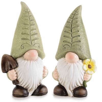 Colored terracotta garden gnomes with flower and shovel in hand