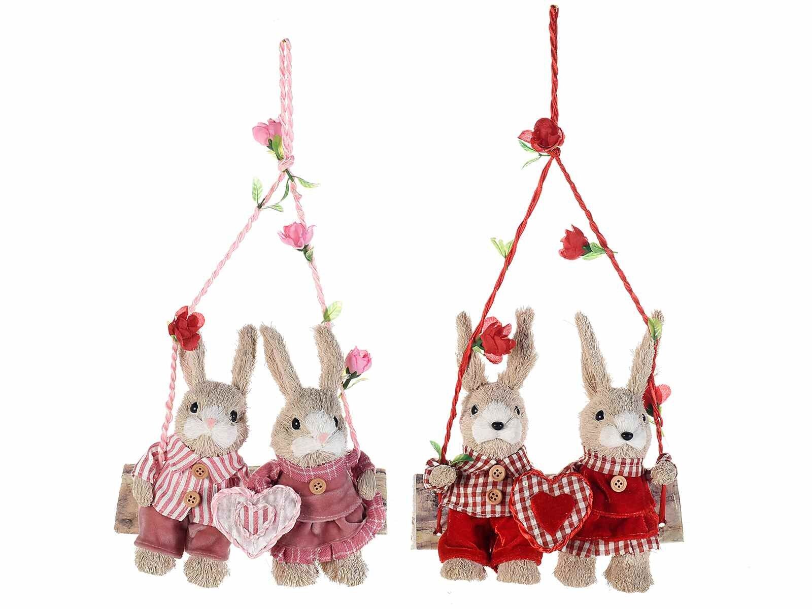 Pair of fiber bunnies on a swing to hang