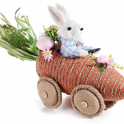 Conejos de Pascua en fibra natural sobre máquina de zanahorias