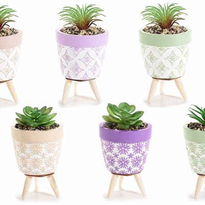 Vases en béton décorés de plantes artificielles et trépied en bois