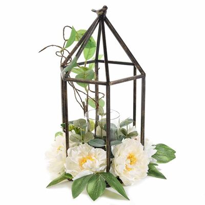 Decorative metal cages with artificial peonies and candle vase