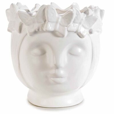 Opaque white porcelain vases with faces and butterflies