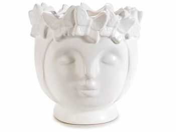 Vases en porcelaine blanche opaque avec visages et papillons