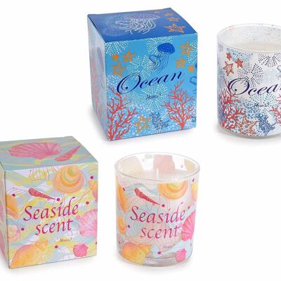 Scented candles in a glass jar with maritime motifs and writings in a gift box