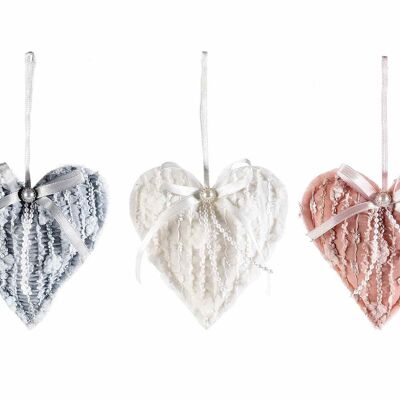 Padded fabric hearts with white pearl decorations and bows to hang