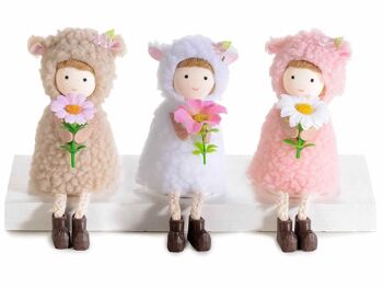 Poupées habillées en mouton aux longues jambes avec une petite fleur à déposer