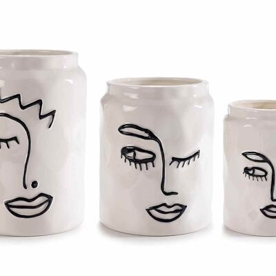 Set of white porcelain vases with hammered effect women's faces