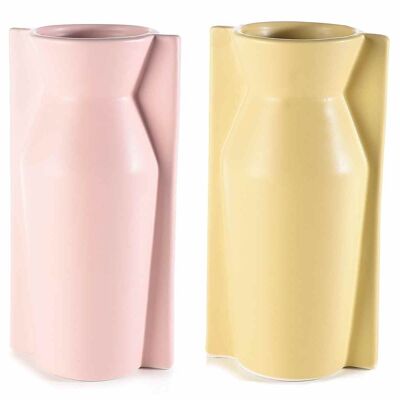 Geometric design vases in matt pink and yellow colored porcelain
