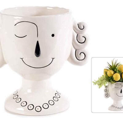 Dekorative Porzellanvasen mit lächelndem Gesicht