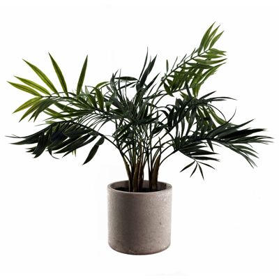 Künstliche Baumpflanze Palme im dekorativen Pflanzgefäß