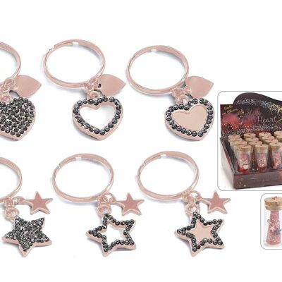 Anillos ajustables "Star Heart" oro rosa 14zero3 en tubo de ensayo de vidrio y display