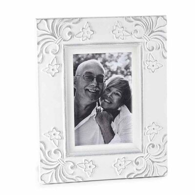 Wooden photo holder to place with relief decorations