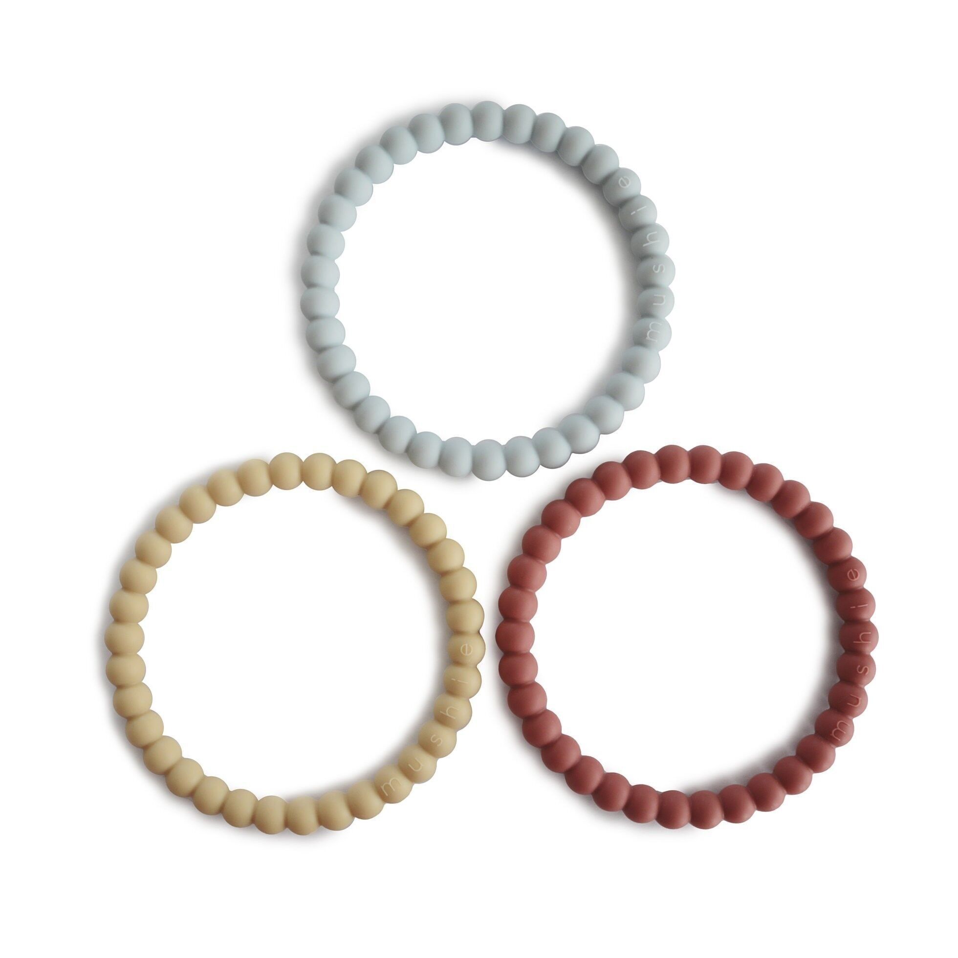 Mushie - Bracciale per la dentizione con perle - 100% silicone alimentare - 100% privo di BPA, BPS, PVC e ftalati - 7,62 x 7,62 cm - Set di 3 braccialetti - Colori soft / terracotta / periw