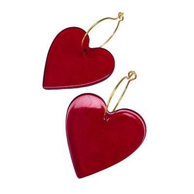 Transparent red heart hoop earrings in resin