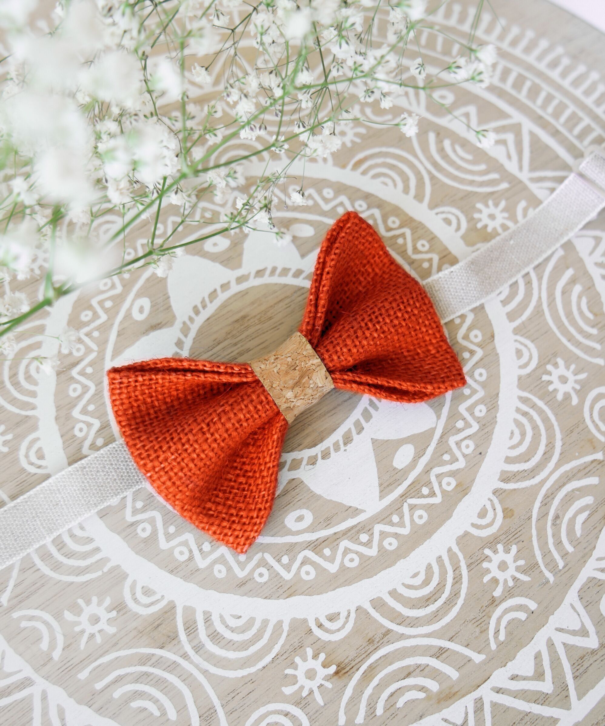 Papillon in tela arancione e sughero