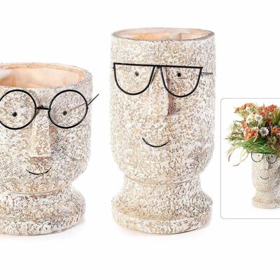 Resin flower vases in the shape of a face with glasses in a large and small set
