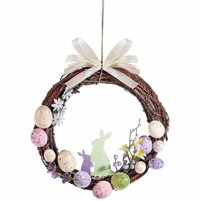 Wooden Easter wreaths with colored eggs, wooden rabbit decorations and bow to hang