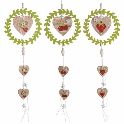 Wooden garlands to hang, hanging hearts and fruit decorations