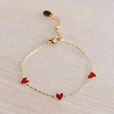 Stainless steel fine bracelet with 3 hearts – red/gold