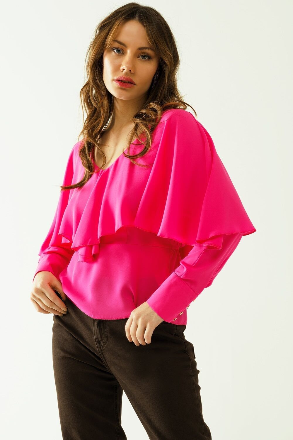 Ruffled V-neck top with buttoned cuffs and tie in the back detal in fuchsia