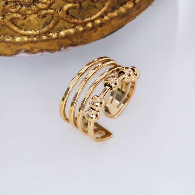 Anillo multilínea dorado con ruedas