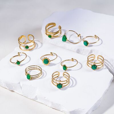 Set of 10 rings with green stones
