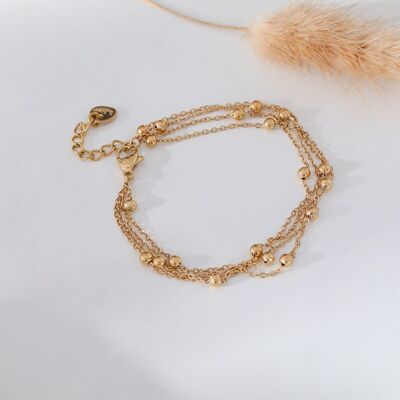 Gold multi chain bracelet with balls