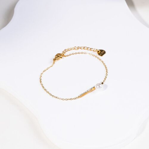 Bracelet chaîne dorée barre à strass avec perle