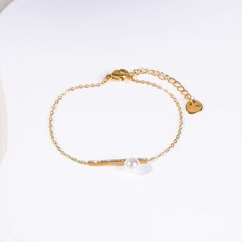 Bracelet chaîne dorée barre à strass avec perle 2