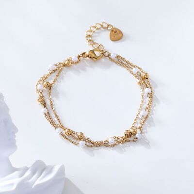 Bracelet multi chaîne avec perle