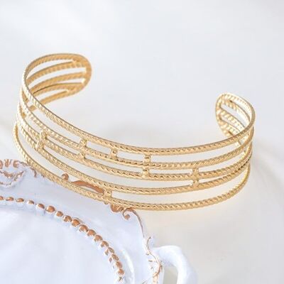 Gold multi line bracelet with dots